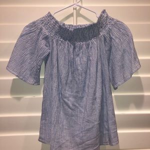over the shoulder blue striped shirt